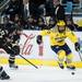 Michigan senior center A.J. Treais skates with the puck in the third period of the game against Western Michigan on Saturday. Daniel Brenner I AnnArbor.com